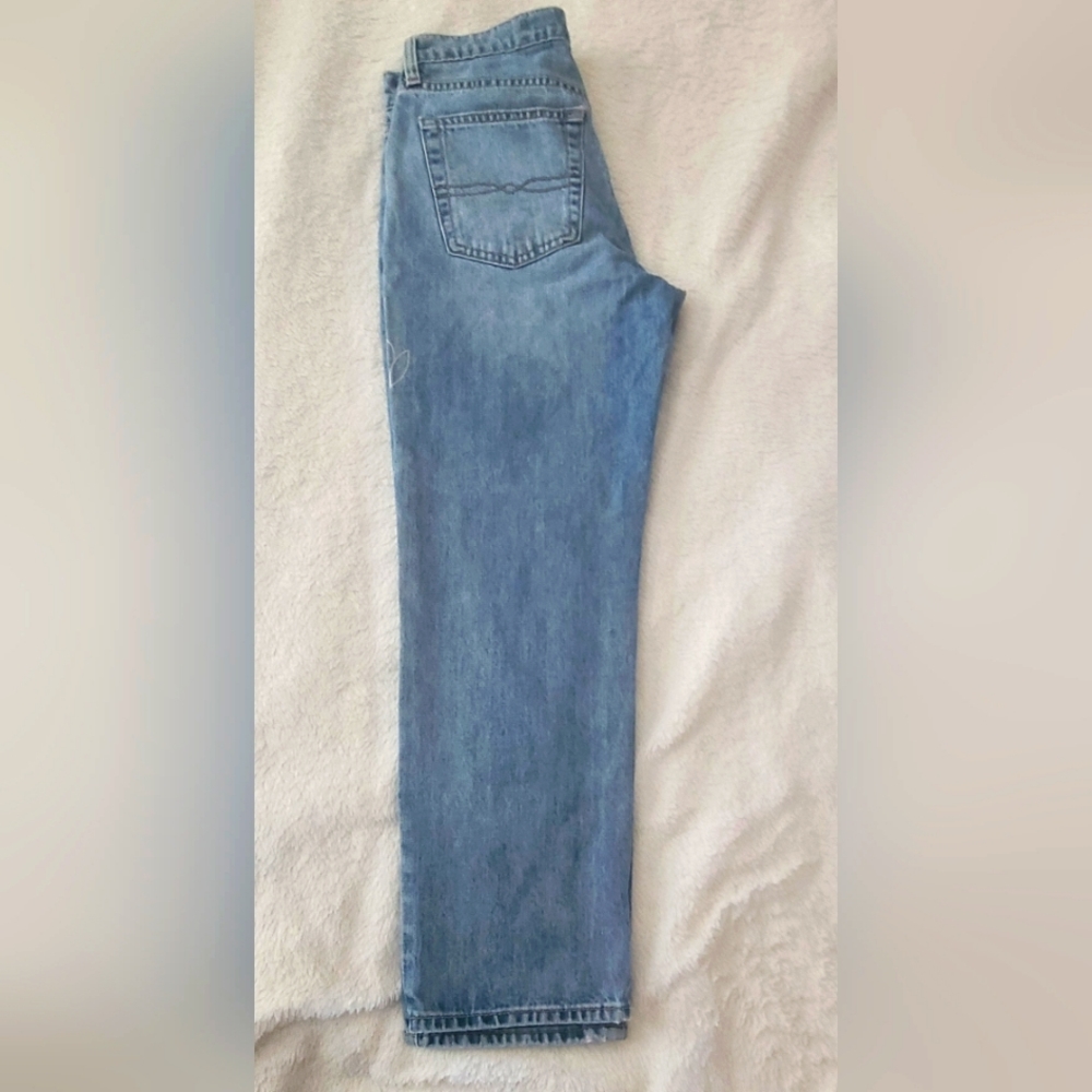Lucky Brand Size 6/28 Blue w/flowers on the side.
